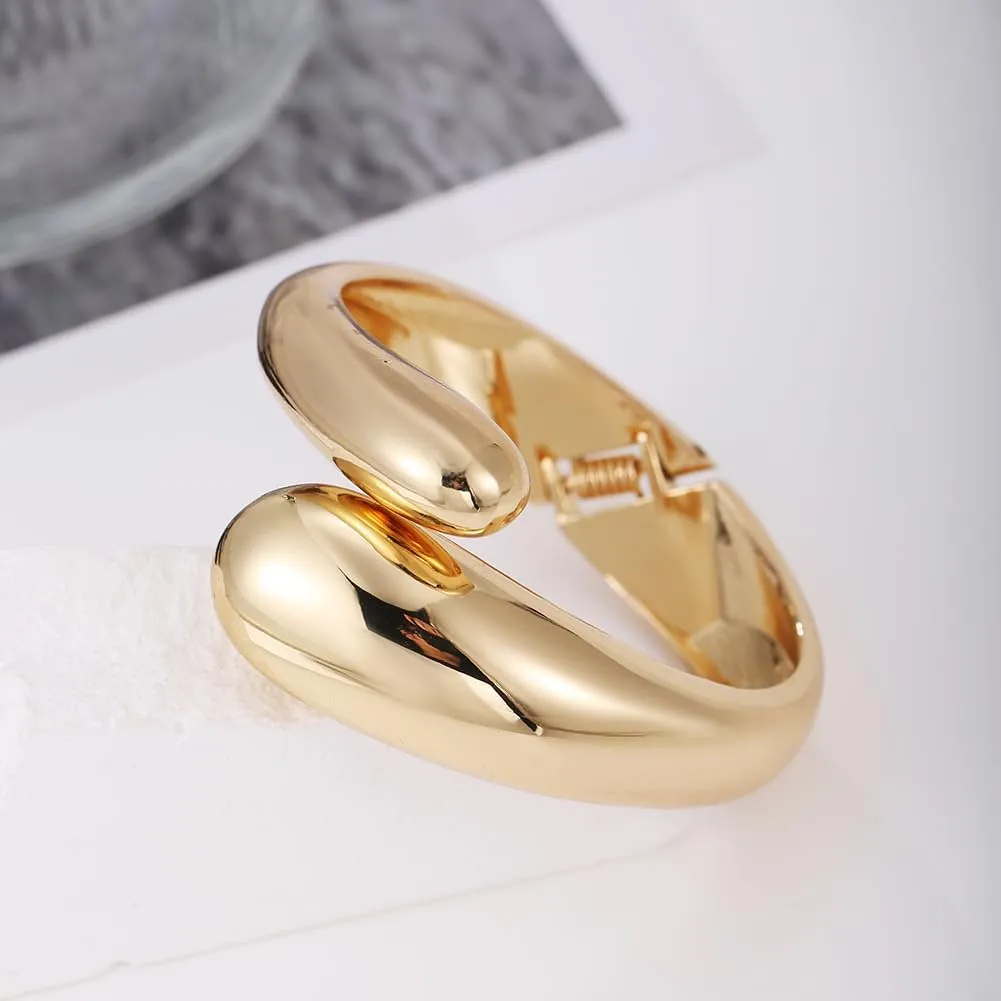 Gold Polished Chunky Twisted Hinged Waterdrop Bangle Bracelet for Women Spiraled Oval Bangle Bracelet