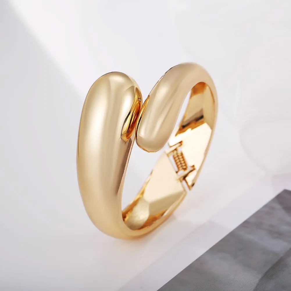 Gold Polished Chunky Twisted Hinged Waterdrop Bangle Bracelet for Women Spiraled Oval Bangle Bracelet