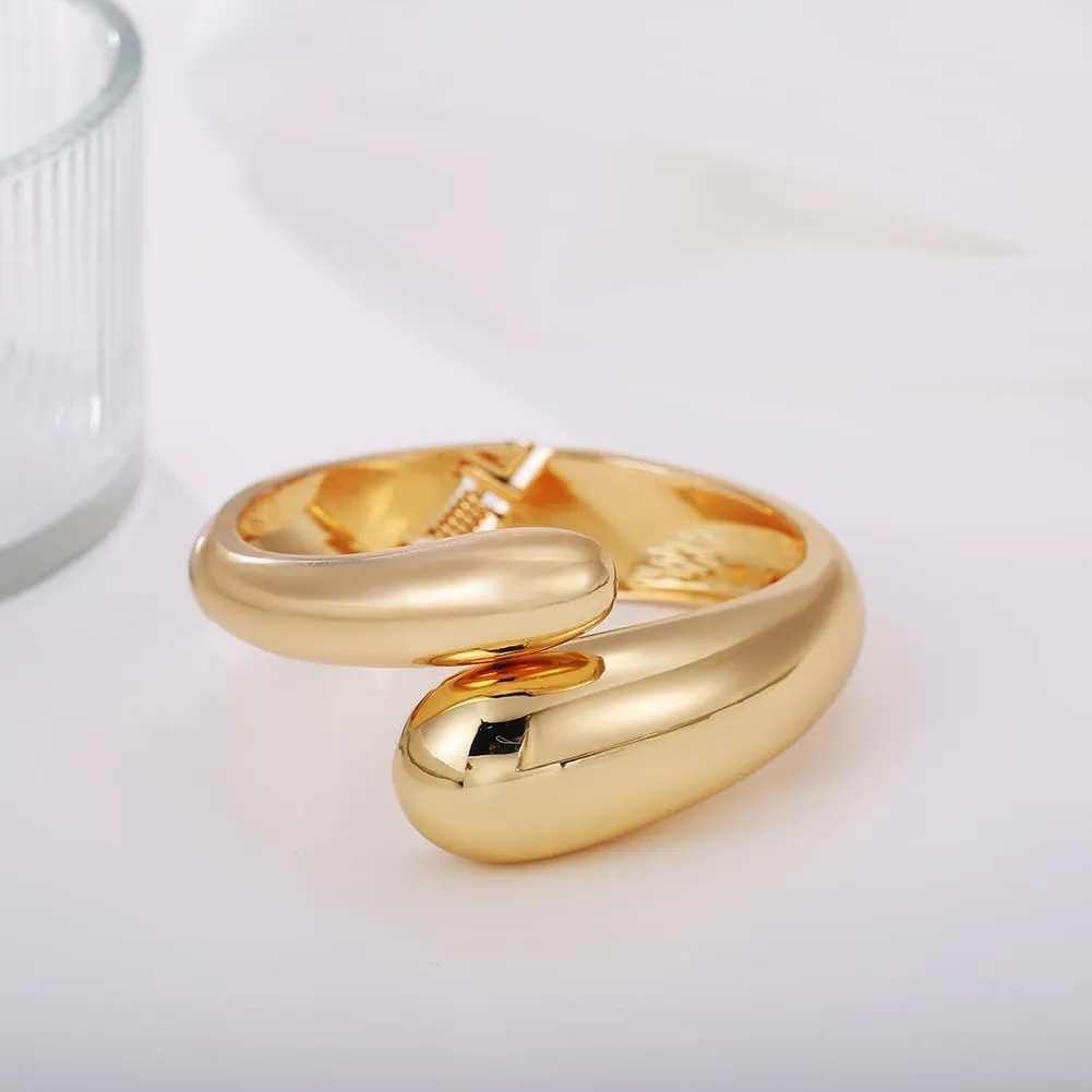 Gold Polished Chunky Twisted Hinged Waterdrop Bangle Bracelet for Women Spiraled Oval Bangle Bracelet