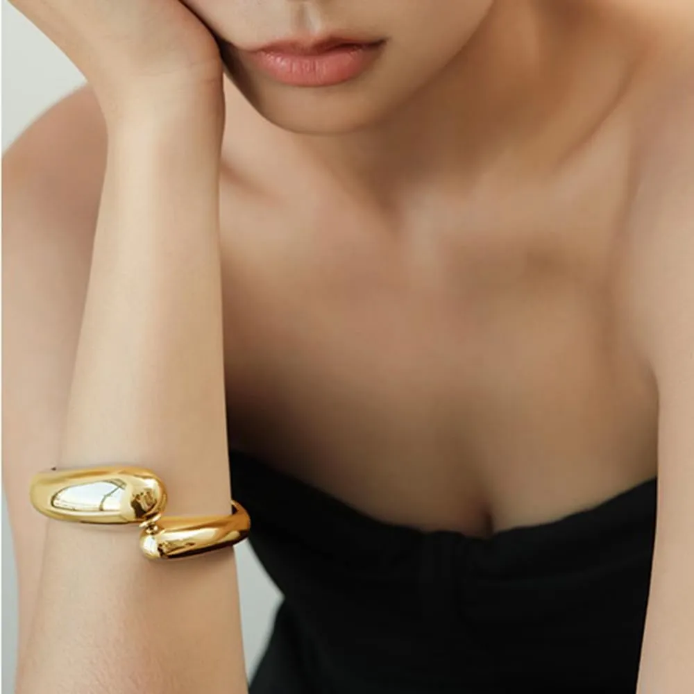Gold Polished Chunky Twisted Hinged Waterdrop Bangle Bracelet for Women Spiraled Oval Bangle Bracelet
